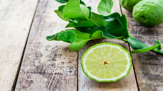 Bergamot on wooden table, (Kaffir lime)