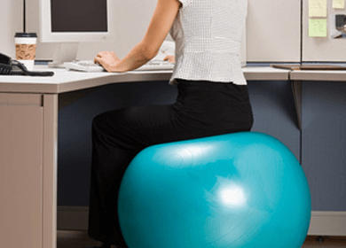 sitting on exercise ball at work