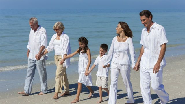 Grandparents, Mother, Father Children Family Walking Beach