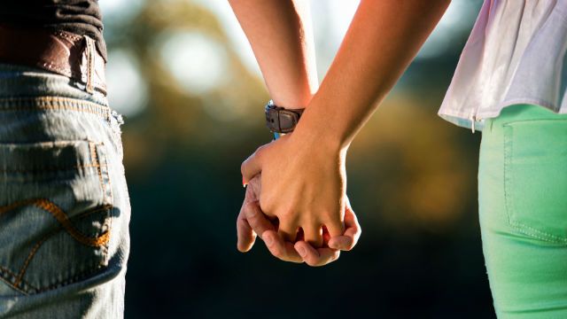 couple holding hand