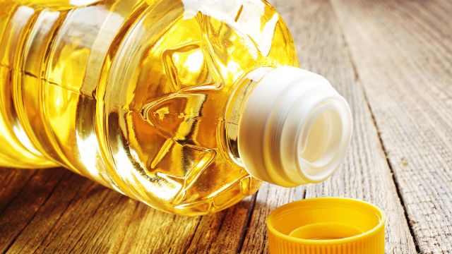 Vegetable oil in plastic bottle closeup