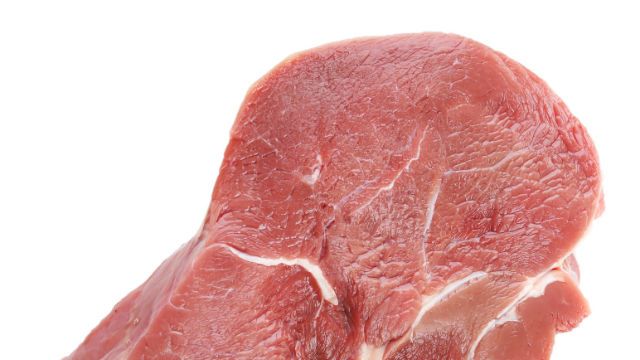 Raw beef steak isolated on white