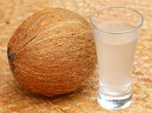 Fresh Coconut with water in a glass