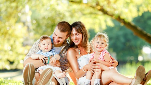 Happy family enjoying in the park