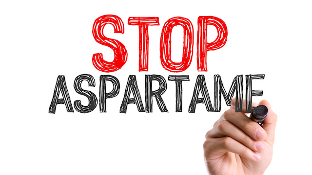 Hand with marker writing: Stop Apastarme