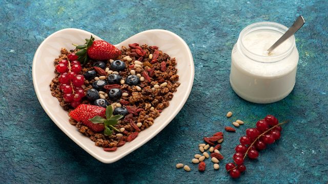 Muesli and fresh berries for breakfast. top view