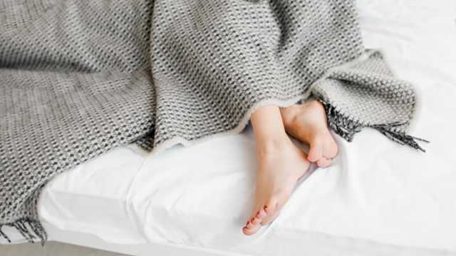 Stick your toes out to sleep better