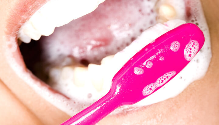 Conventional toothpaste may contain codium lauryl sulfate, which makes it foam.