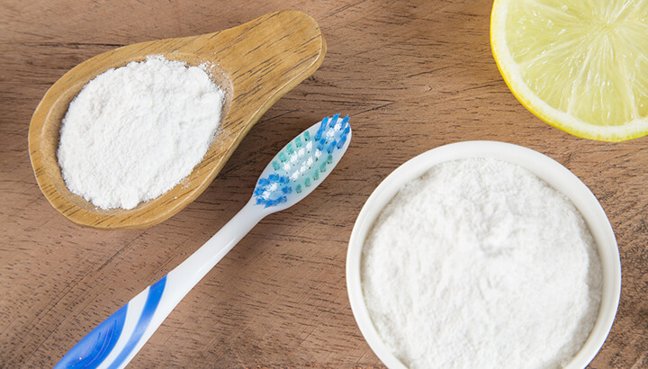 Make a whitening paste out of baking soda, lemon and water.