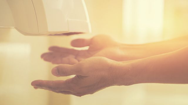 Hand dryer,Hand Air Dryer In Public Toilet or Washrooms,Hand dryer in public toilet,selective focus,vintage color