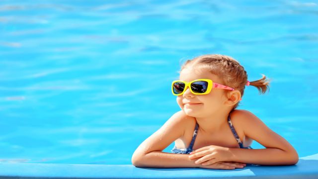 Cute girl in pool
