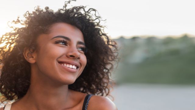 Outdoor portrait of smiling african american girl