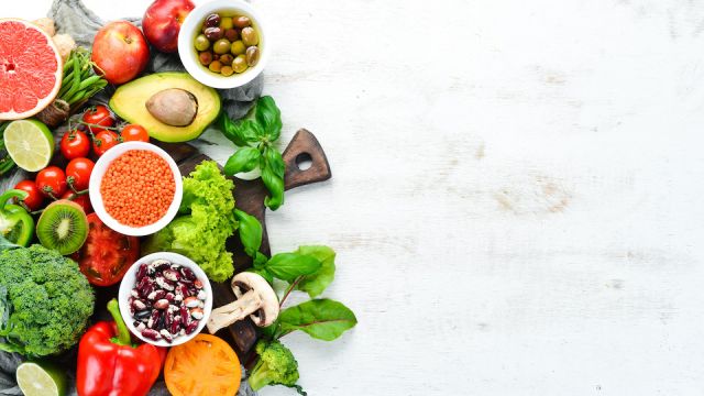 Healthy Organic Food. Fresh fruits and vegetables. Top view. Free space for your text.