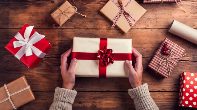 Man holding Christmas present
