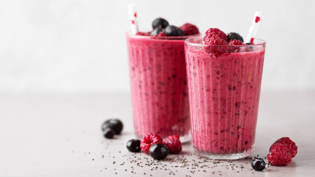 Healthy appetizing red smoothie dessert in glasses